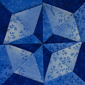 Compass Rose Miniature Block size 4in pieced with variegated blue fabrics