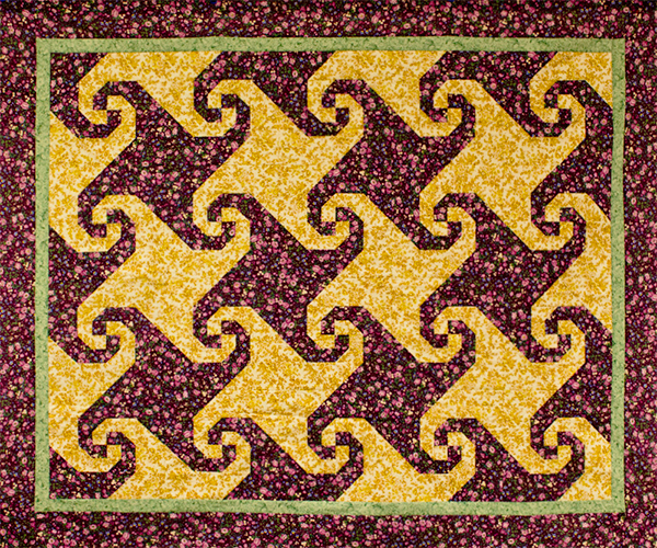 Snail's Trail quilt top image in purple and yellow fabric